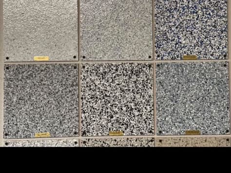 Client finish board displaying a range of decorative flake samples