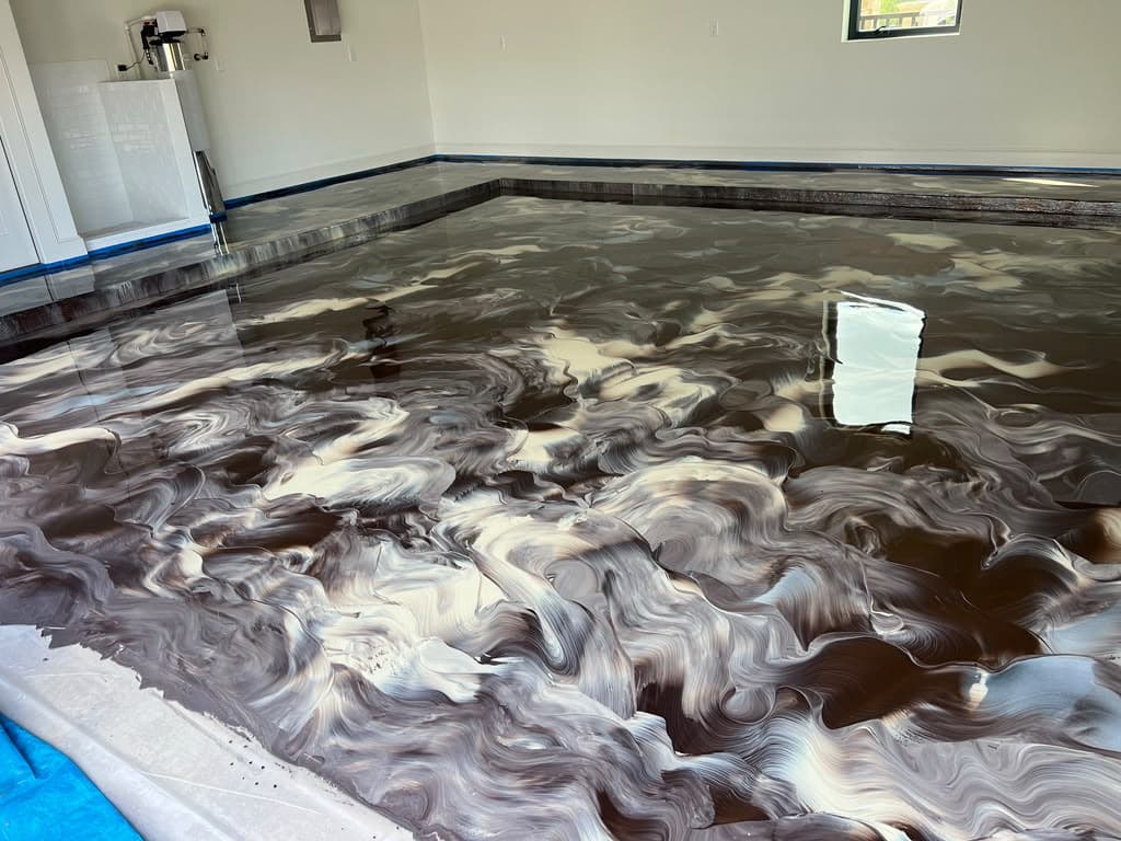 Warm brown, cream, and gray metallic floor with flowing movement