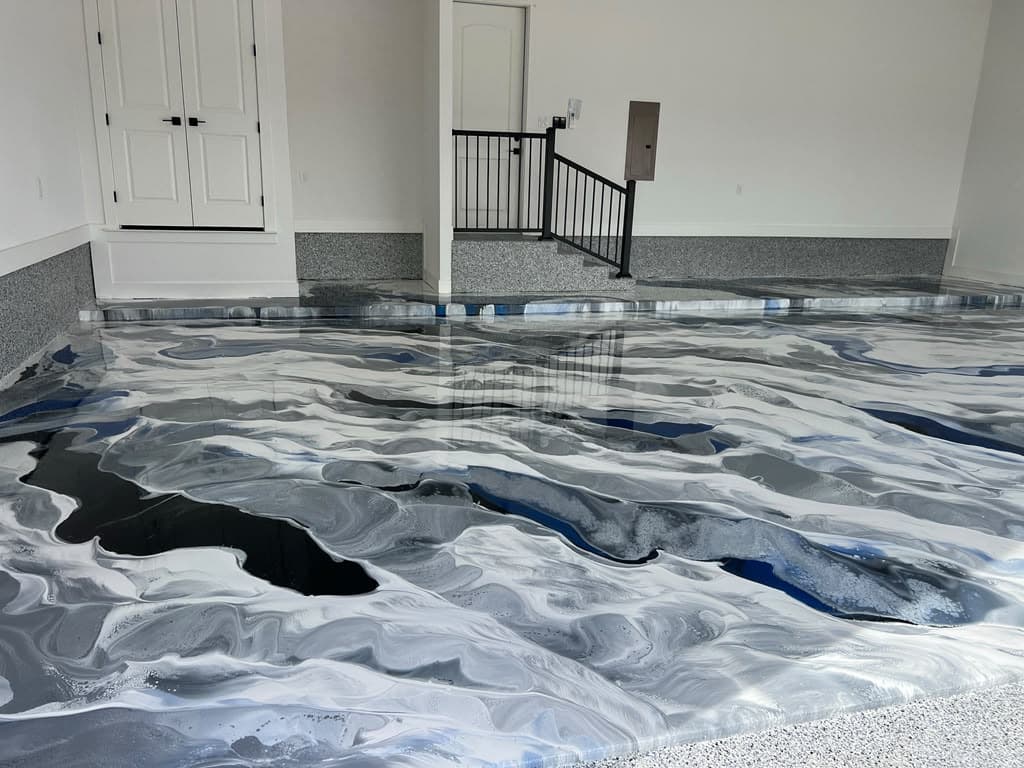 White, charcoal, and black metallic floor in a bright interior