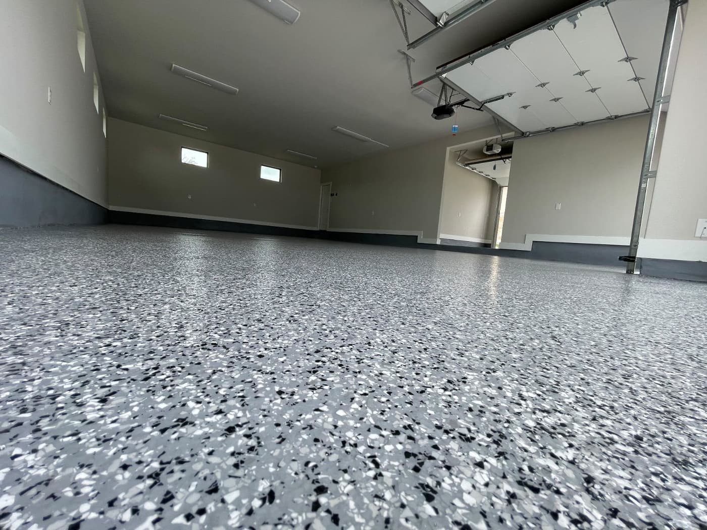 Completed flake epoxy floor in a residential garage